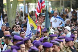 Tens of thousands attend funeral of Israeli soldier whose remains were held in Gaza for 11 years