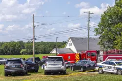 Suspect kills 2 women in Kentucky church after shooting state trooper, police say