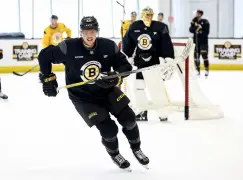 Bruins place Hampus Lindholm on IR, recall Jonathan Aspirot
